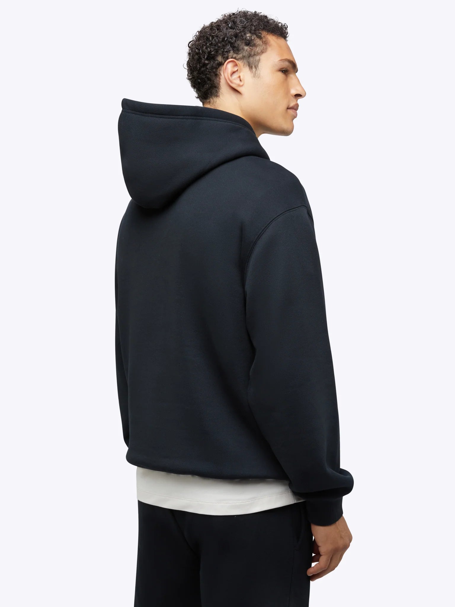 Mens Divine Fleece Hoodie in the color black from the brand, CUTS.