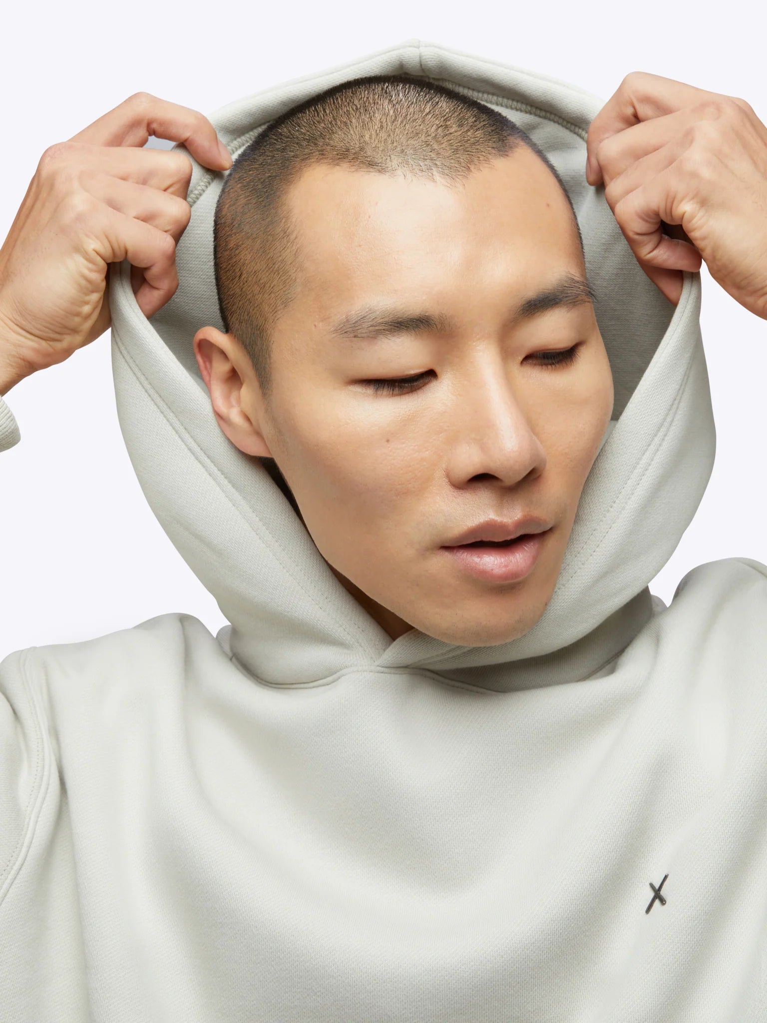 Mens Divine Fleece Hoodie in the color parchment from the brand, CUTS.