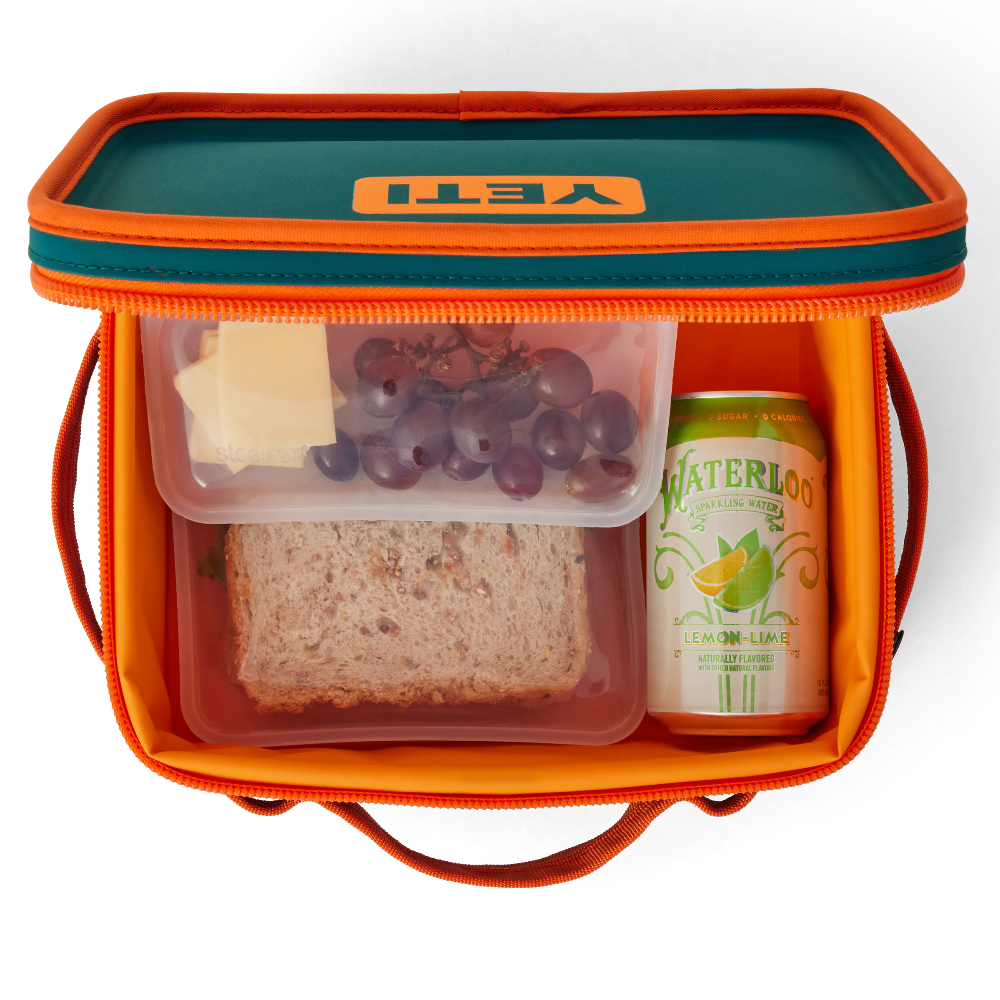 YETI Daytrip Lunch Box In color teal and orange. From YETI Crossover collection.