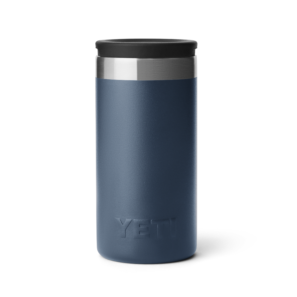A navy blue shot glass travel case with a stainless steel rim at the top with a black lid, and a navy blue YETI logo at the bottom of the case.